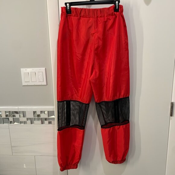 Red joggers with fishnet cutouts - Picture 2 of 2